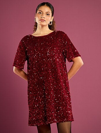 Abito a paillettes con schiena annodata
