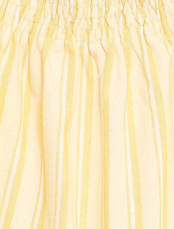 Abito a righe con bretelline