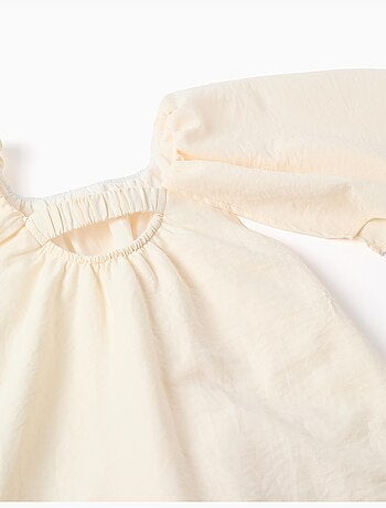 Abito con maniche a mantella e applicazione floreale