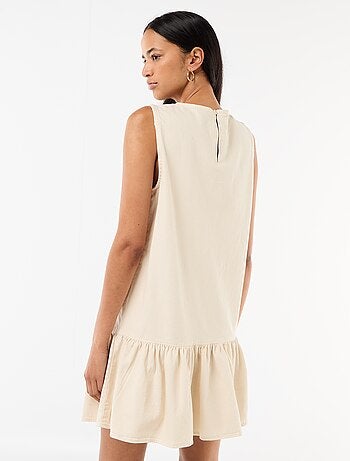 Abito in denim senza maniche con fondo a balza