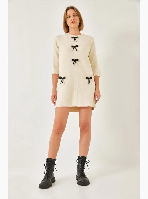 Abito in maglia con fiocco lucci - Kiabi
