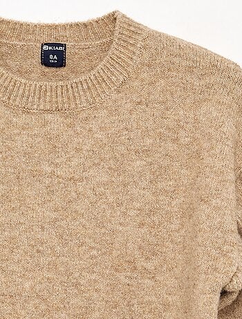 Abito in maglia con spalle a volant