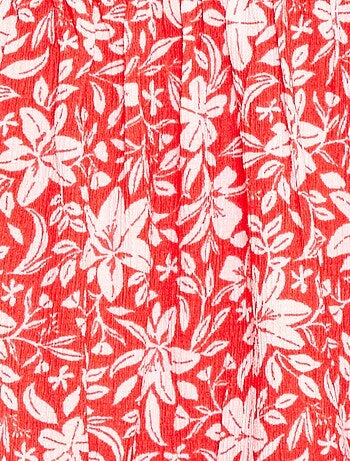 Abito in maglia traforata sui lati