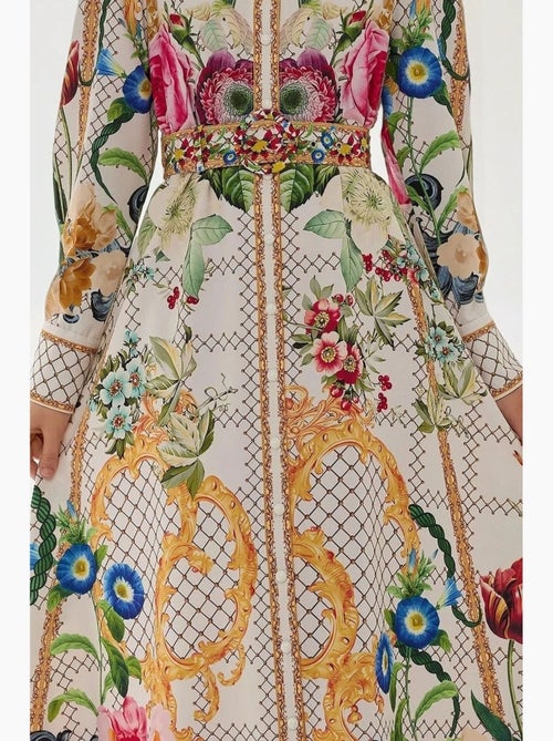 Abito lungo maxi stampato a maniche lunghe con cintura hiccup - Kiabi Abito lungo maxi stampato a maniche lunghe con cintura hiccup - Kiabi