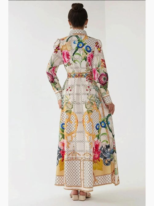 Abito lungo maxi stampato a maniche lunghe con cintura hiccup - Kiabi Abito lungo maxi stampato a maniche lunghe con cintura hiccup - Kiabi