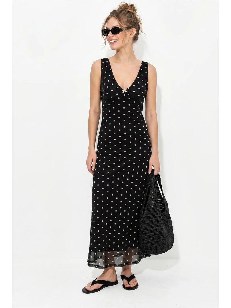 Abito maxi in tulle a pois lucci Nero - Kiabi