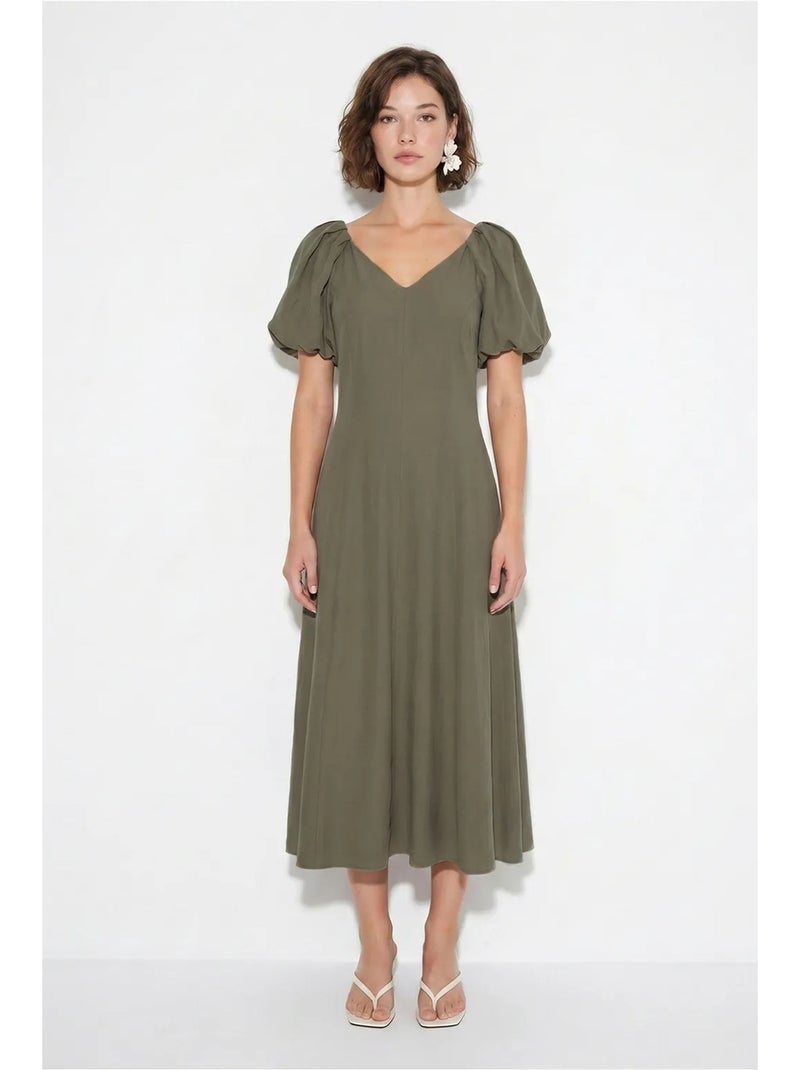 Abito midi a linea a con scollo a v e zip lucci Cachi - Kiabi