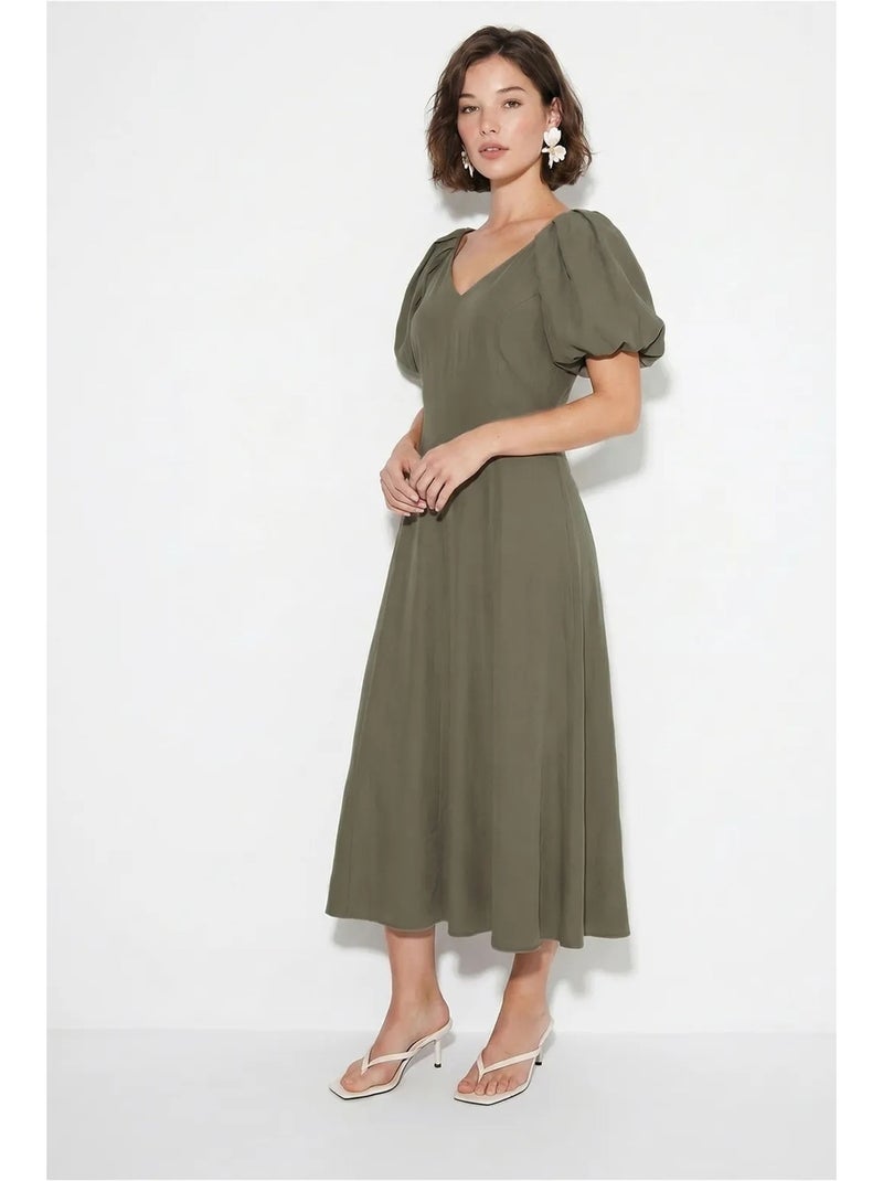 Abito midi a linea a con scollo a v e zip lucci Cachi - Kiabi