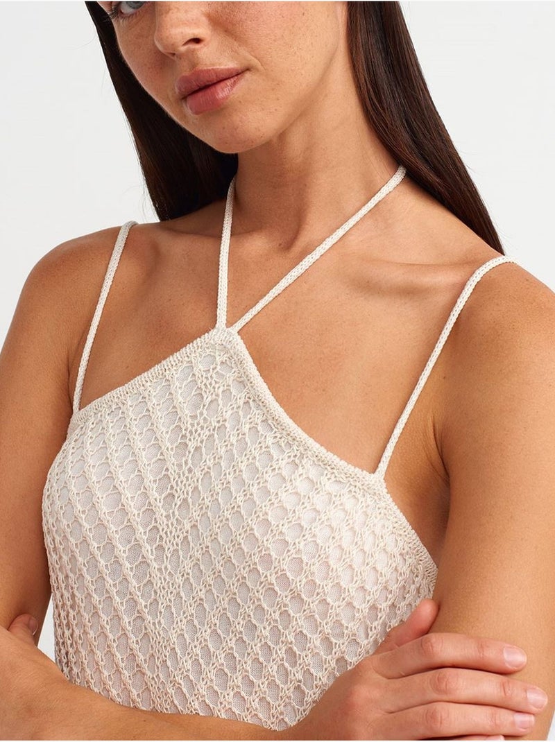 Abito midi allacciato al collo testurizzato con cut-out Crema - Kiabi