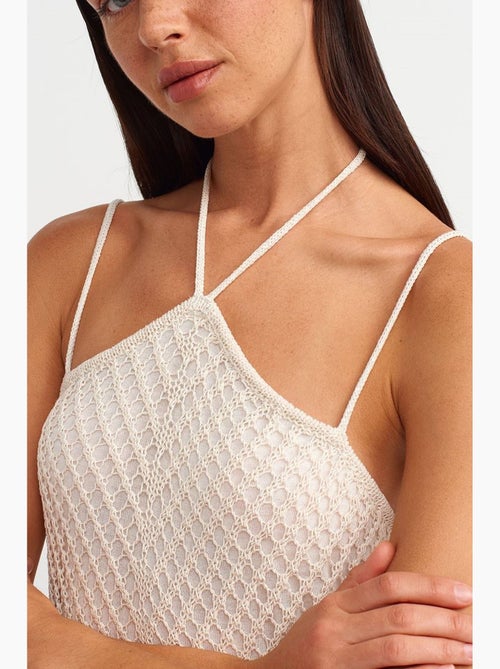 Abito midi allacciato al collo testurizzato con cut-out dilvin - Kiabi Abito midi allacciato al collo testurizzato con cut-out dilvin - Kiabi