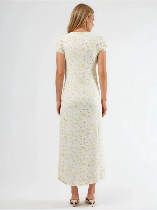 Abito midi floreale con scollo a u e dettaglio fiocco busem - Kiabi Abito midi floreale con scollo a u e dettaglio fiocco busem - Kiabi