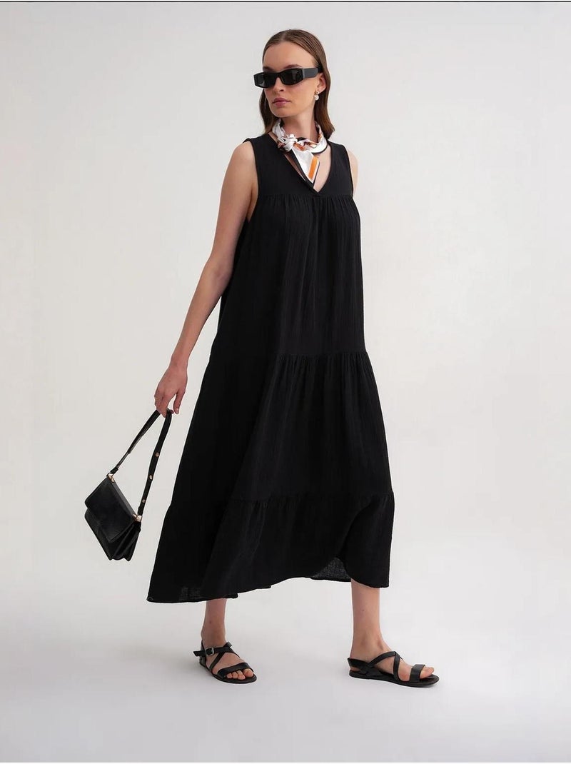 Abito midi in mussola senza maniche con scollo a v e tasche mixray Nero - Kiabi