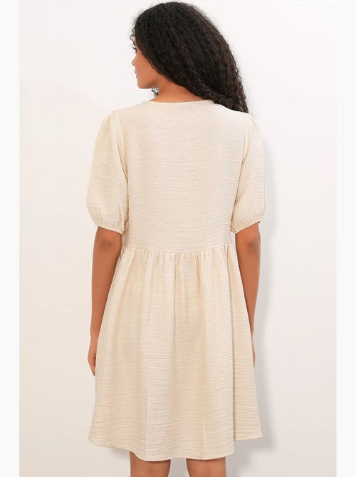 Abito mini a grembiule da donna a linea a bdart - Kiabi Abito mini a grembiule da donna a linea a bdart - Kiabi
