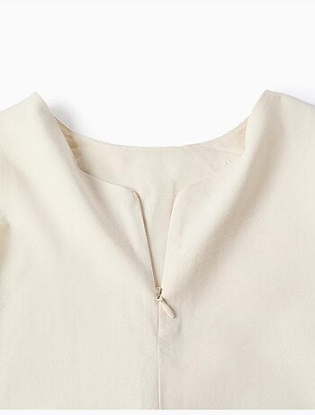 Abito senza maniche a trapezio con fiori ricamati