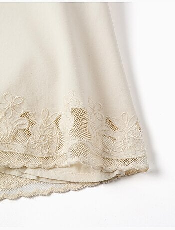 Abito senza maniche a trapezio con fiori ricamati