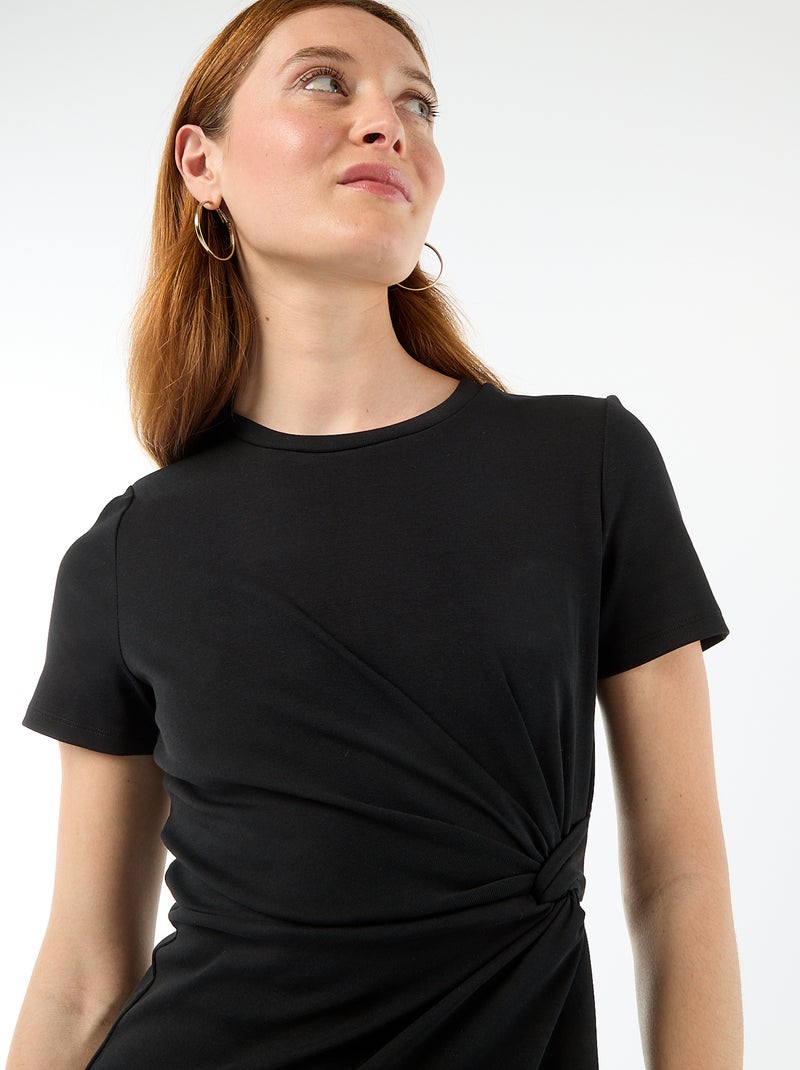 Abito T-shirt corto con nodo decorativo Nero - Kiabi