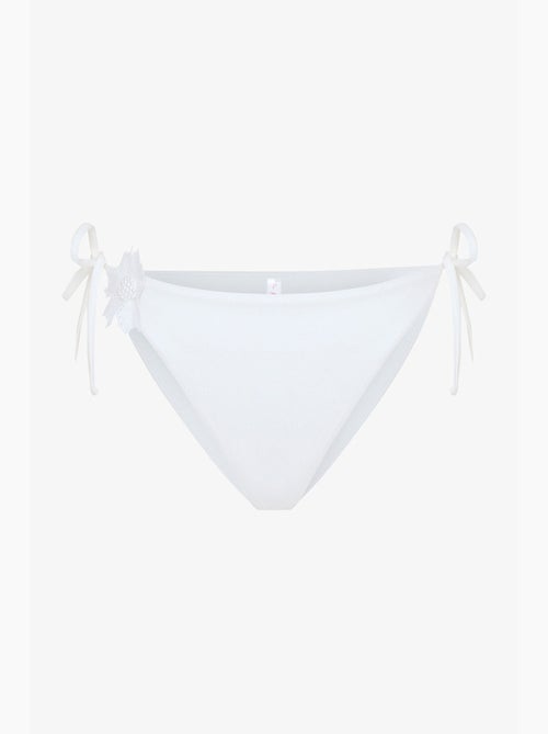 Adeline slip bikini con accessorio floreale penti - Kiabi Adeline slip bikini con accessorio floreale penti - Kiabi