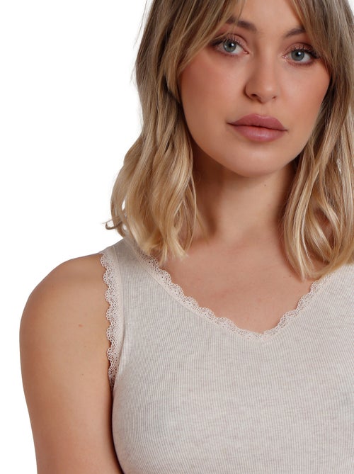 ADMAS T-shirt senza maniche a costine romantiche da donna - Kiabi ADMAS T-shirt senza maniche a costine romantiche da donna - Kiabi