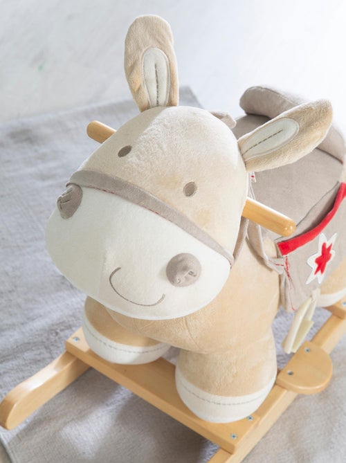 Asinello a dondolo con staffe, sella e briglie per bebè da 18 mesi – "Roba" - Kiabi