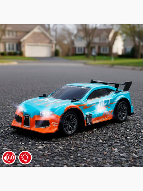Auto radiocomandata con luci e suoni 1:16 speed & go - Kiabi Auto radiocomandata con luci e suoni 1:16 speed & go - Kiabi