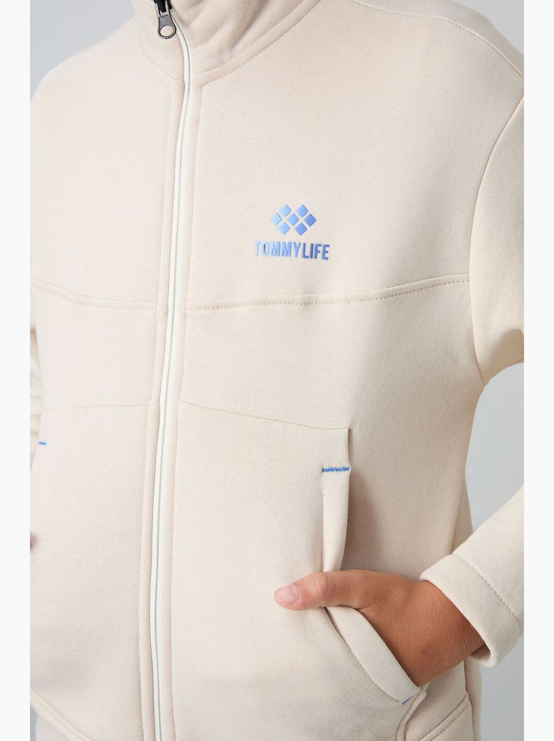 Bambino felpa con collo zip e tasca tommy Beige argilla - Kiabi
