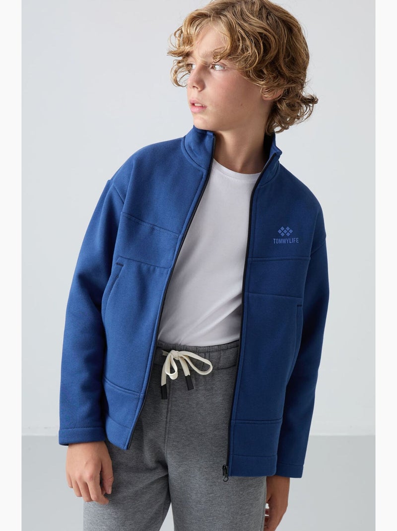 Bambino felpa con collo zip e tasca tommy Blu - Kiabi