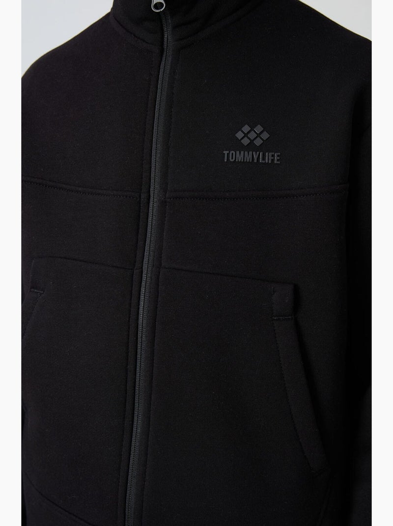 Bambino felpa con collo zip e tasca tommy Nero - Kiabi