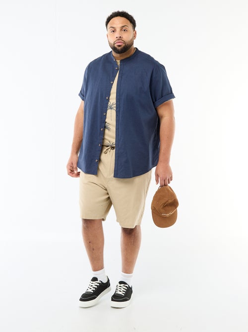 Bermuda chino con apertura a bottoni + zip + lacci - Kiabi Bermuda chino con apertura a bottoni + zip + lacci - Kiabi