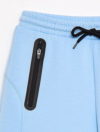 Bermuda in felpa con tasche zippate