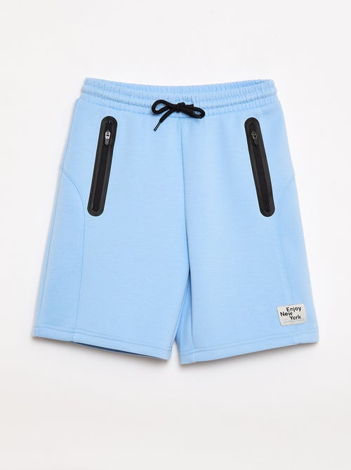 Bermuda in felpa con tasche zippate - Kiabi