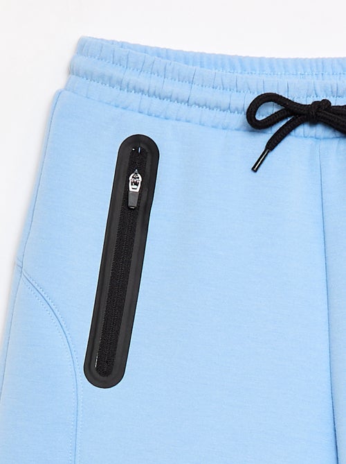 Bermuda in felpa con tasche zippate - Kiabi