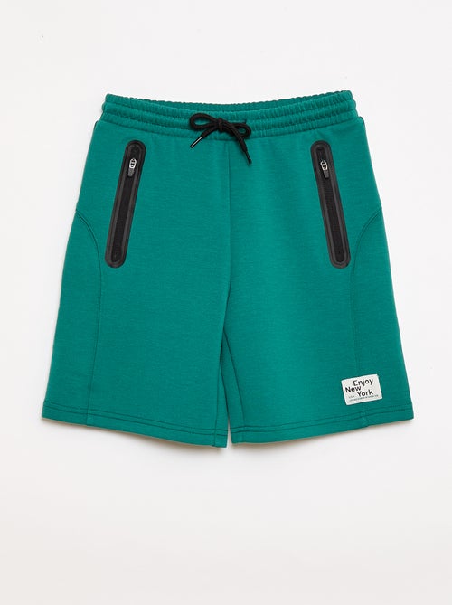 Bermuda in felpa con tasche zippate - Kiabi