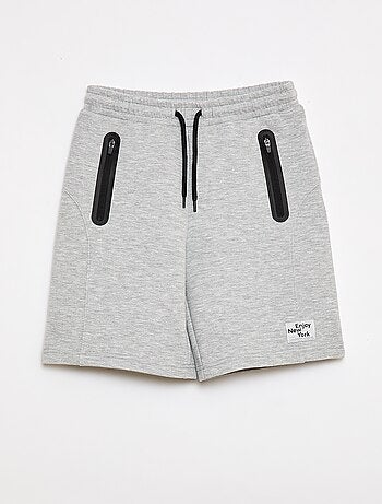 Bermuda in felpa con tasche zippate