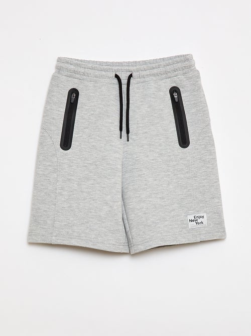 Bermuda in felpa con tasche zippate - Kiabi