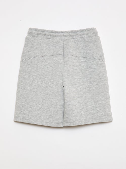 Bermuda in felpa con tasche zippate - Kiabi
