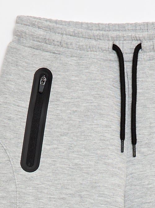 Bermuda in felpa con tasche zippate - Kiabi