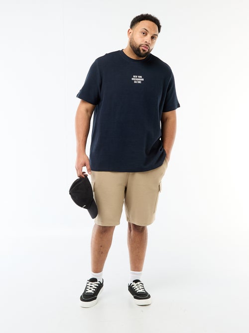 Bermuda in maglia piqué con tasche a patta - Kiabi Bermuda in maglia piqué con tasche a patta - Kiabi