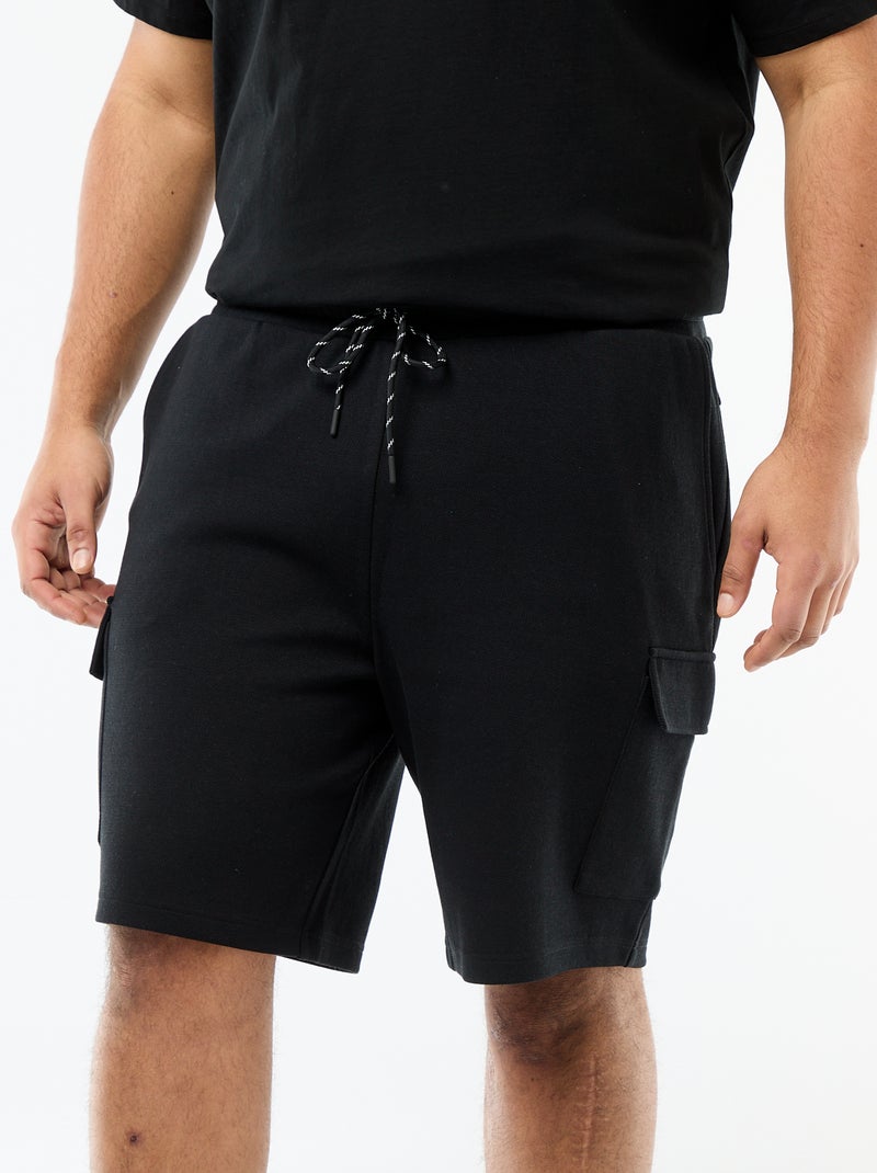 Bermuda in maglia piqué con tasche a patta Nero - Kiabi
