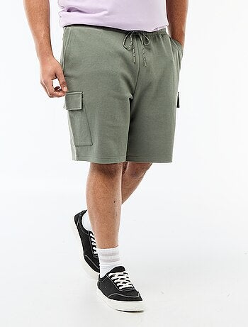 Bermuda in maglia piqué con tasche a patta