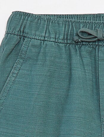 Bermuda in twill tinta unita con tasche