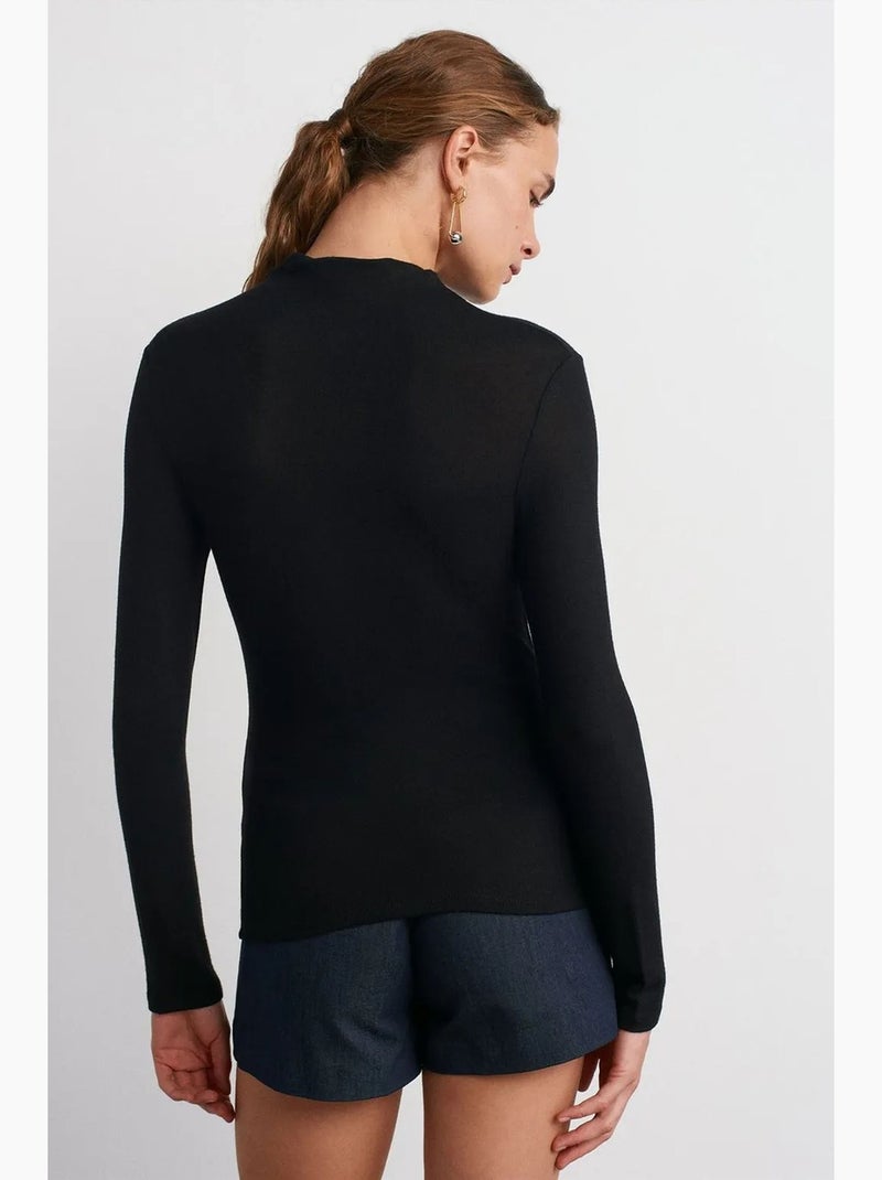 Blusa a collo alto a coste a maniche lunghe dilvin Nero - Kiabi