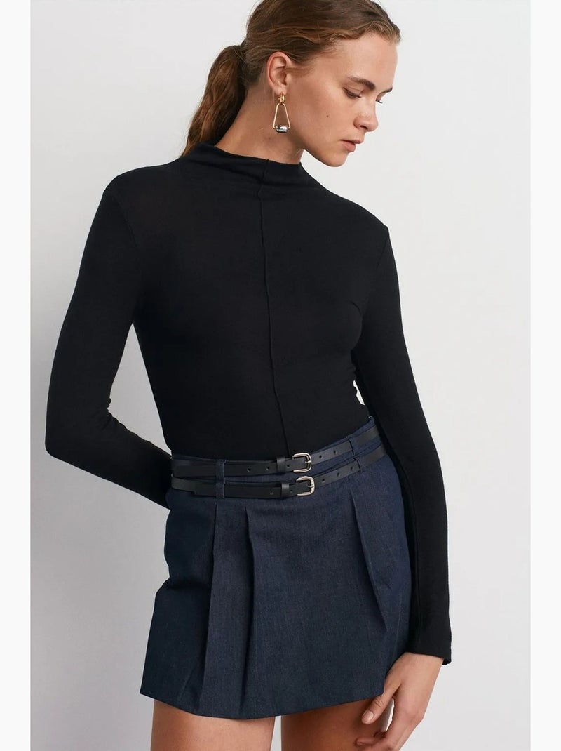 Blusa a collo alto a coste a maniche lunghe dilvin Nero - Kiabi