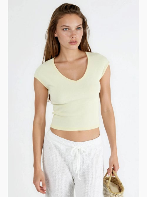 Blusa a coste con scollo a v busem - Kiabi Blusa a coste con scollo a v busem - Kiabi