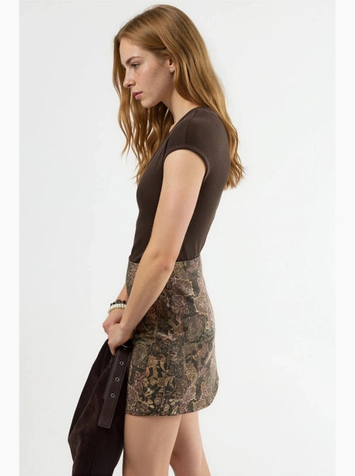 Blusa a coste con scollo a v busem - Kiabi Blusa a coste con scollo a v busem - Kiabi