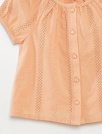 Blusa a maniche corte con ricami a punto inglese