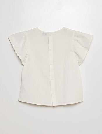 Blusa a maniche corte con ricami