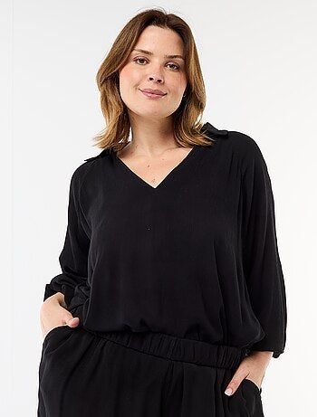 Blusa a maniche lunghe con colletto a punte libere