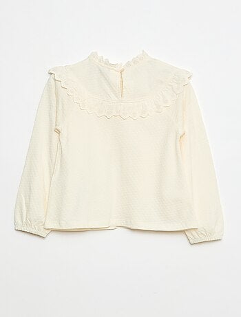 Blusa a maniche lunghe con collo rotondo e plastron con volant e ricami