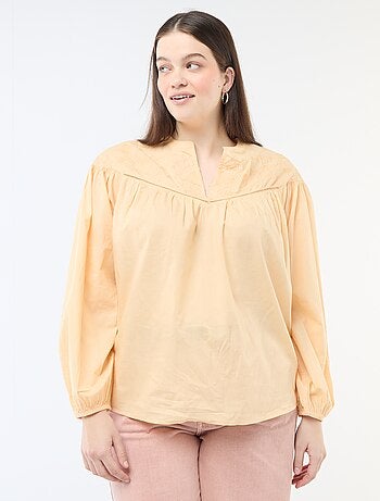 Blusa a maniche lunghe con ricami