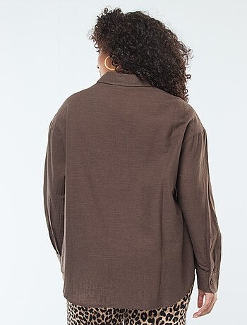 Blusa a maniche lunghe con ricami traforati